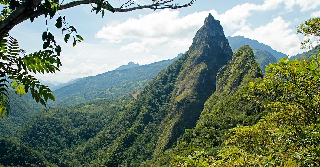 The peaks of Fura and Tena rising over the emerald country of Boyacá, Colombia