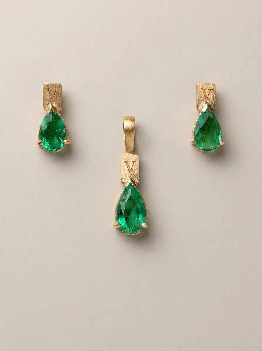 Drops of Eden — Three-piece pear-cut Colombian emerald origin set, 18k gold